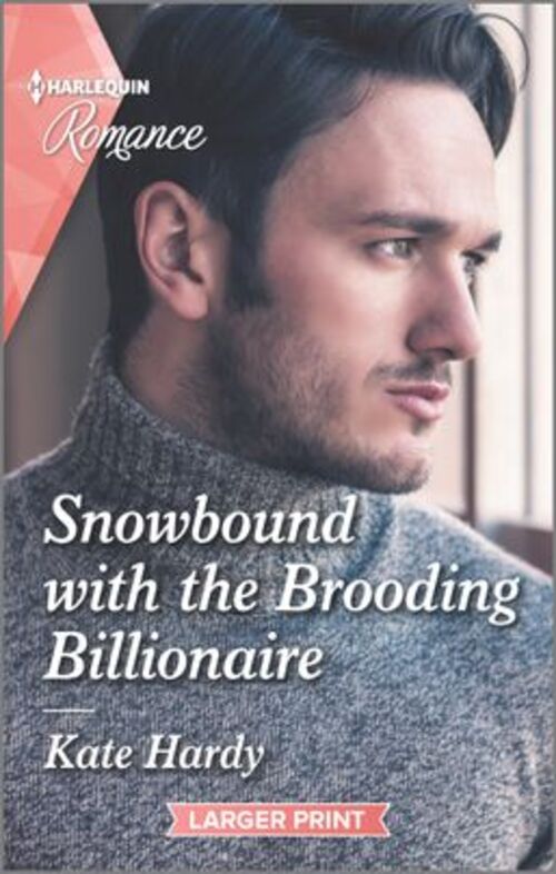 SNOWBOUND WITH THE BROODING BILLIONAIRE