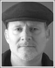 T. J. English