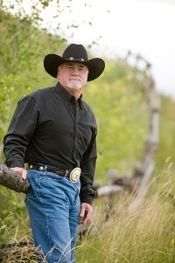E. Travis Cox