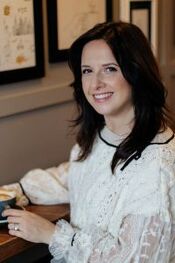 Kat Sloane | The owner of a lakeside bed-and-breakfast who is reunited with her childhood sweetheart Kat Sloane